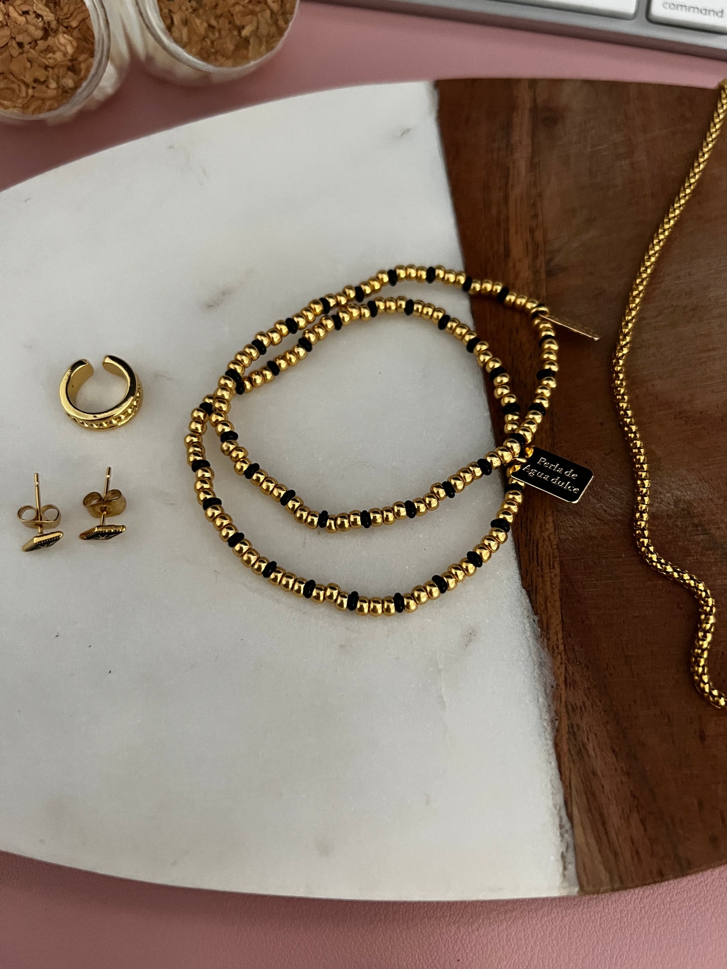 Gold and black bracelets